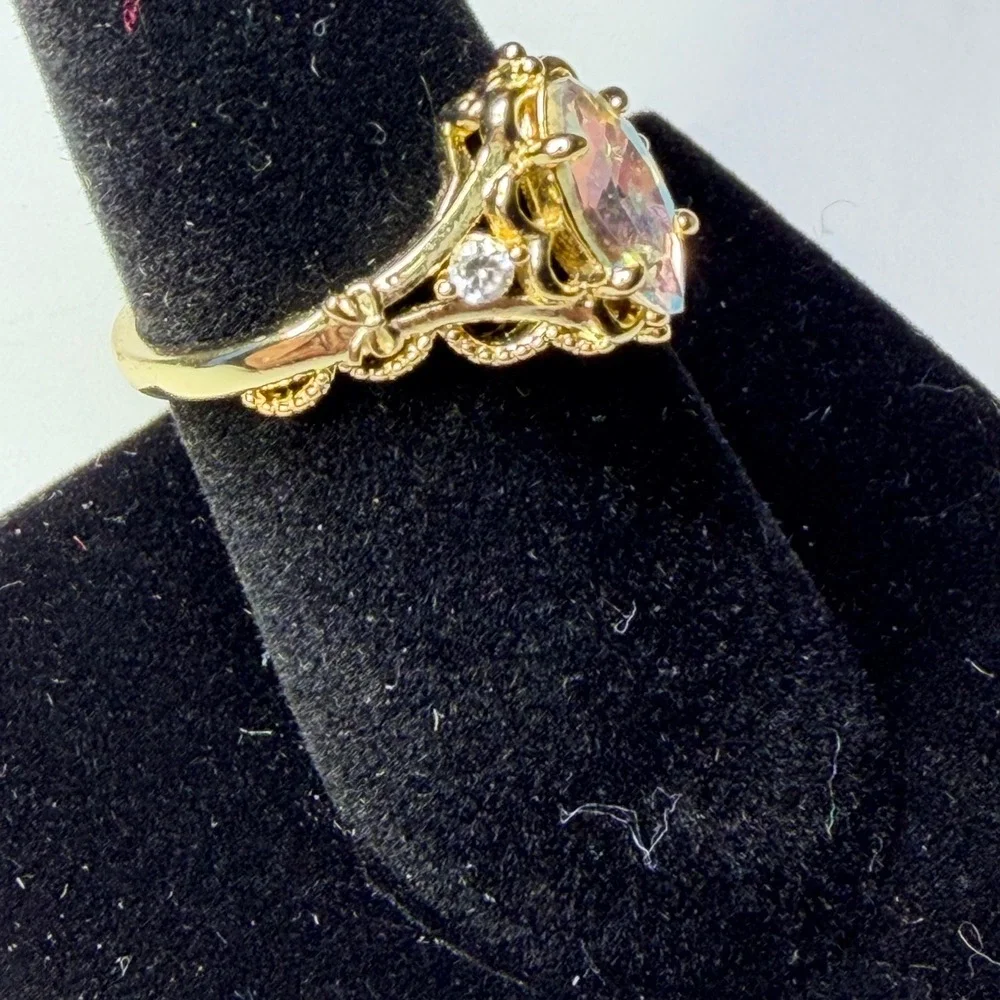 Fragrant Jewels Gold Tone Marquise Iridescent Stone Filigree Bow Ring Size 8.25